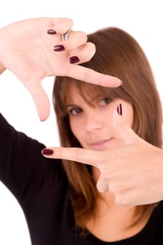 Young woman showing framing hand gesture - focus on hands