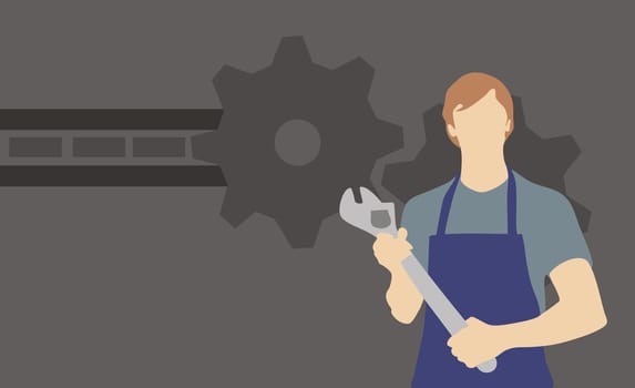 Male mechanic holding an adjustable wrench
