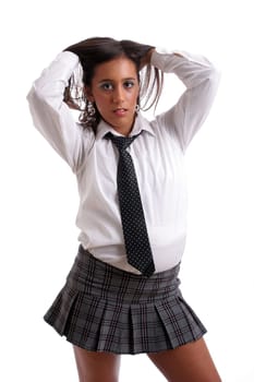 Hot schoolgirl posing isolated over white background