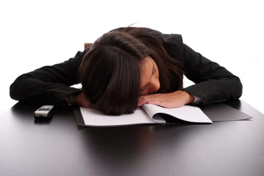 young business woman sleeping on the desk, isolated in white background