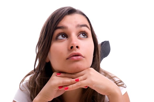 Young sad girl portrait, isolated over black