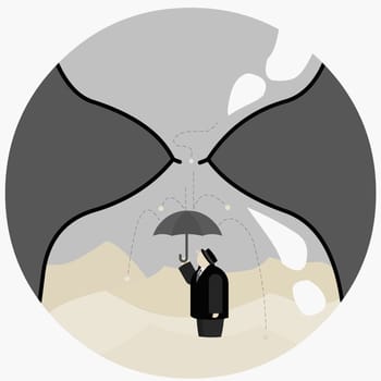 Businessman with an umbrella standing in hourglass