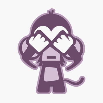 Monkey covering its eyes with its hands