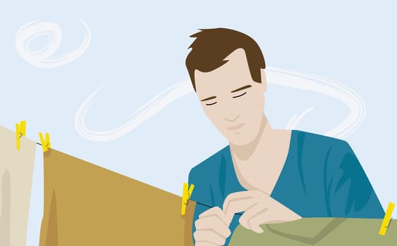 Young man putting clothes on a clothesline
