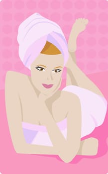 Young woman lying down in a towel