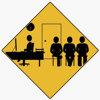 Businessman using a computer with others beside him