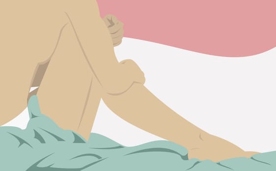 Woman sitting on the bed and hugging her knees