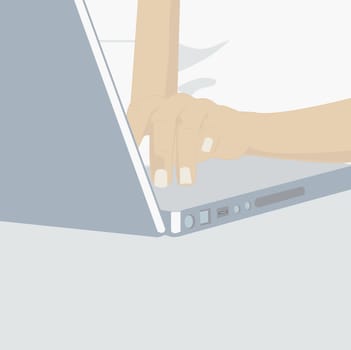 Close-up of human hands using a laptop