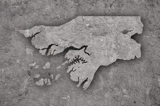 Map of Guinea-Bissau on weathered concrete