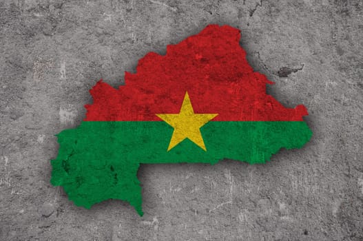 Map and flag of Burkina Faso on weathered concrete