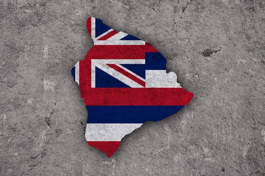 Map and flag of Hawaii on weathered concrete