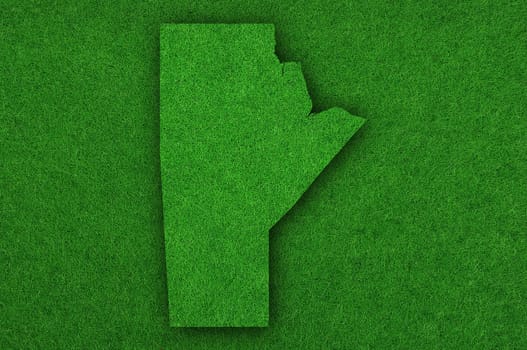 Map of Manitoba on green felt