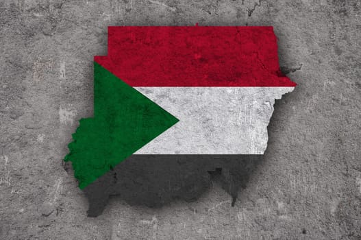 Map and flag of Sudan on weathered concrete