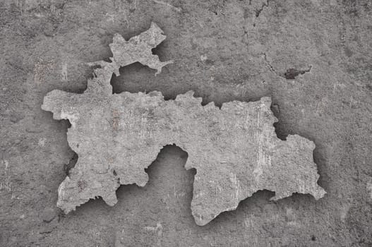 Map of Tajikistan on weathered concrete