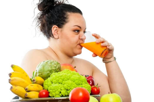 Portrait of obese teen with organic food bowl drinking fruit juice.Isolated on white background.