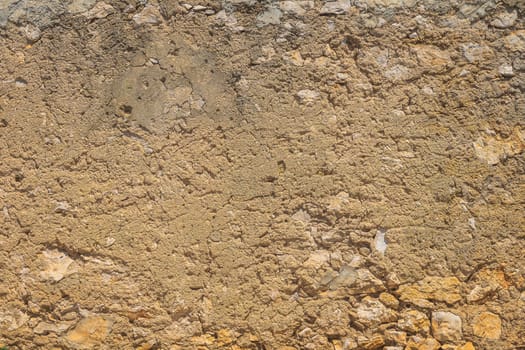 Old, rustic corroded and damaged stone and plaster wall. High quality texture and background for your projects and creative work