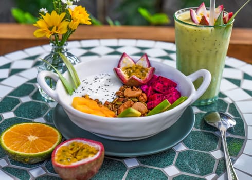 Granola with greek yogurt, honey, fresh fruits, chia seeds