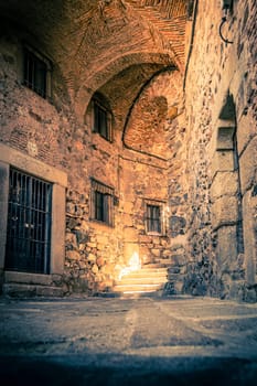 Small and cozy alley in the historical city of Caceres, Extremadura, Spain. Travel and tourism.