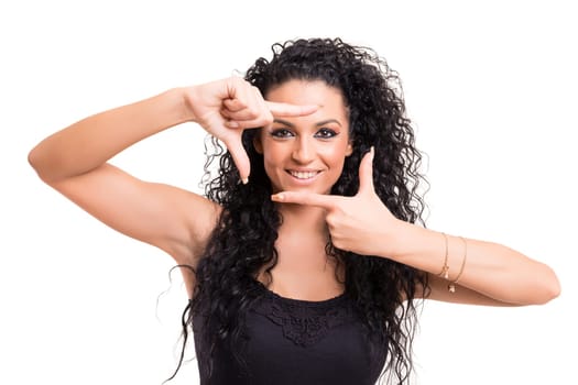 Young woman making framing key gesture - isolated over white