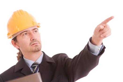 Engineer with yellow hat, pointing forward - isolated on white