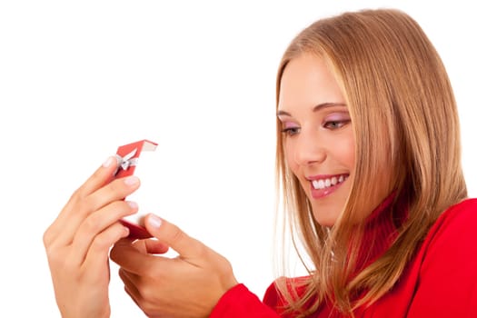 Beautiful young woman recieving wedding ring