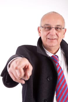 Mature business man pointing forward, isolated over white