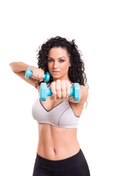 A beautiful young woman exercising - fitness concept