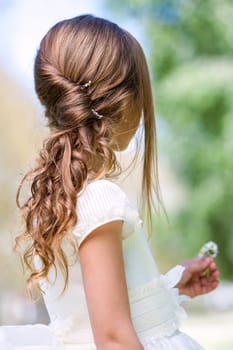 Close up detail of french twist and permanent wave hairstyle.