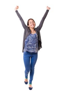 Studio shot: Happy woman with raised arms