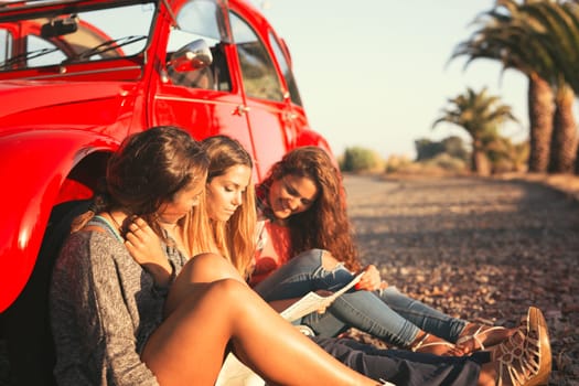 Group of friends on a roadtrip through countryside
