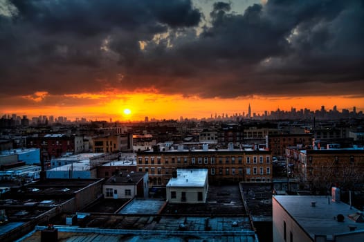 Strom clouds over a cityscape at sunrise