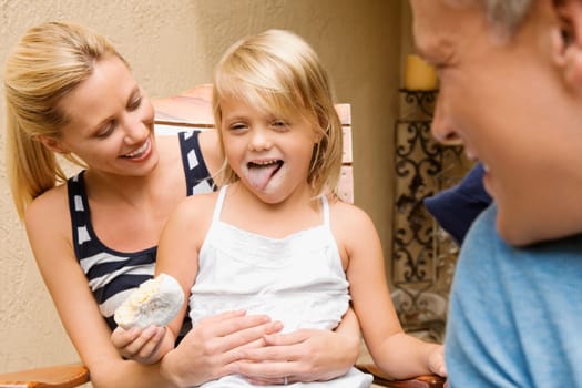 Girl eating a donut