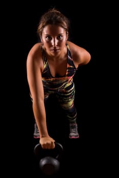 A beautiful young woman exercising - fitness concept