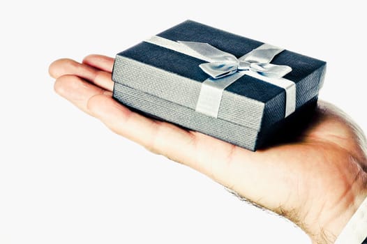 Close_up of a gift on a manŽs palm