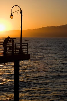Silhouette of a man at an observation point, Santa Monica, Los Angeles County, California, USA