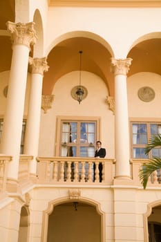 Businessman standing in the balcony, Biltmore Hotel, Coral Gables, Florida, USA