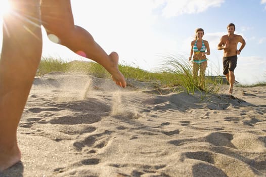 Couple running on the beach