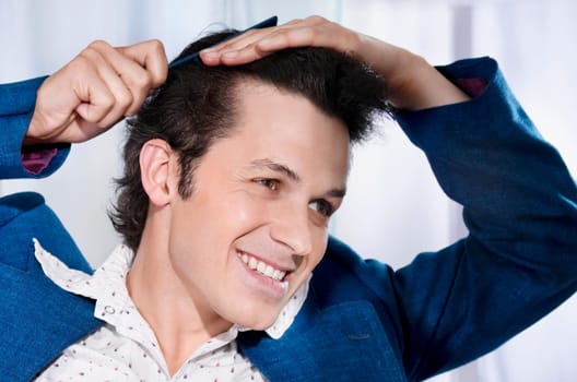 Man combing his hair