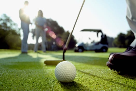 Person playing golf in a golf course