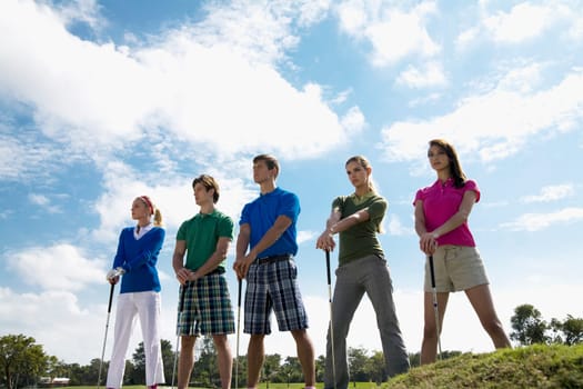 Five friends standing in a golf course, Biltmore Golf Course, Coral Gables, Florida, USA