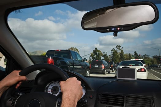 Man driving a car on the highway