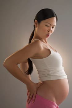 Pregnant woman suffering from backache