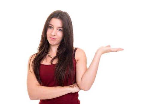 Young beautiful woman presenting your product, isolated over white background