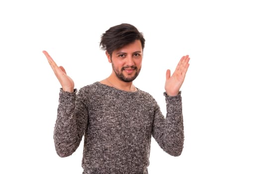 Young man presenting your product, isolated over a white background