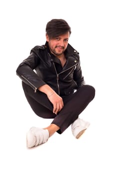 Studio picture of a young and handsome man posing isolated