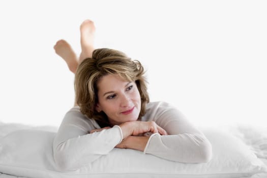 Woman relaxing on the bed