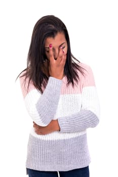 Young woman with an headache, isolated over a white background