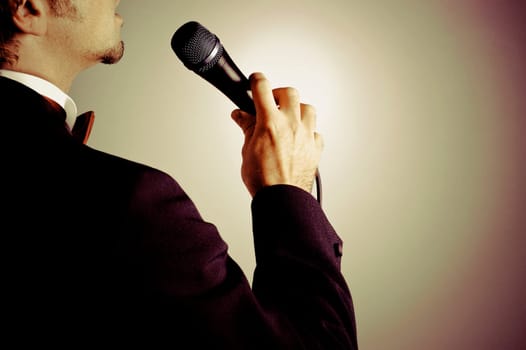 Close_up of a man singing