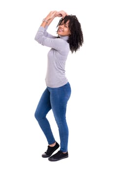 Studio shot of a Very Happy african woman with arms raised
