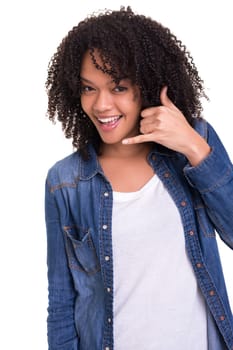 Happy young african woman student making "call me"" sign with hand"